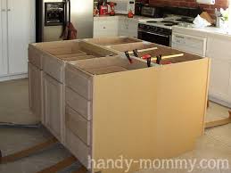 Kitchen islands are a common addition to modern kitchen design. Handy Mommy Diy Kitchen Island Diy Kitchen Island With Seating Kitchen Island Cabinets Kitchen Design Diy