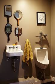 75 beautiful powder room with an urinal