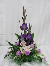 Glads Orchids Moon Carnations Www Carolynsfloraldesigns Com Funeral Flower Arrangements Church Flower Arrangements Tropical Flower Arrangements