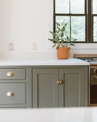 Christine On Instagram Cabinet Hardware Is Everything We Love How Our Nostalgicwar In 2020 Green Kitchen Cabinets Sage Green Kitchen Modern Farmhouse Kitchens