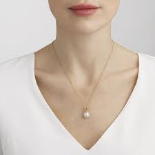 Pearl necklace with gold pendant. Magic 18 Kt Gold Pendant With Diamonds And Pearl Georg Jensen