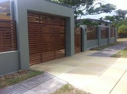 Block Retaining Wall Privacy Fence Carport With Automatic Matching Roller Door Carport Designs Facade House Roller Doors
