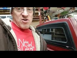 Checking out a Breezer back window in a 1990 s10 mini truck