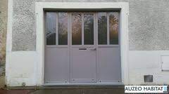 Remplacement D Une Porte De Garage Par Une Porte Fenetre Composee En Acier Jansen A Double Rupture De Pont Thermique Agencement Garage Porte Garage Portes
