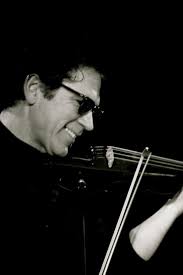 Was Bo Ayars Liberace's music director until the end?