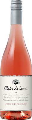 Les fleurs sont sur une base de feutre avec pince à broches métalliques. Clair De Lune California Rose Wine Bronco Wine