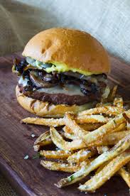 Mushrooms are surprisingly similar in taste and texture to meat when cooked, so they are the perfect ingredient for vegetarian veggie burgers! Mushroom Burger With Provolone Caramelized Onions And Aioli