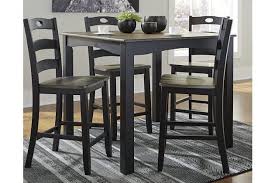 Froshburg Counter Height Dining Table And Bar Stools Set Of 5 Ashley Furniture Homestore Counter Height Dining Room Tables Counter Height Dining Table Dining Room Table