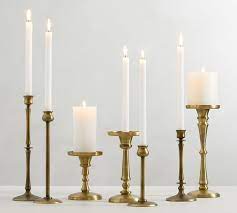 It's not lighted now but it has a timer that shuts off and on!. Booker Taper Candleholders Brass Set Of 4 Pottery Barn