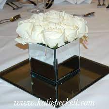 Designers of artificial silk flower arrangements and suppliers of artificial flowers, artificial trees, artificial plants and artificial greenery. Wedding Flowers Sheffield Hire Mirrored Vase Table Centrepiece Roses