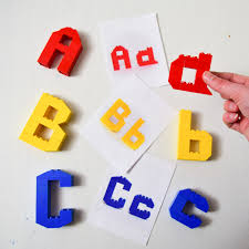 Kids really enjoy tracing them or decorating them with loose parts. Lego Alphabet