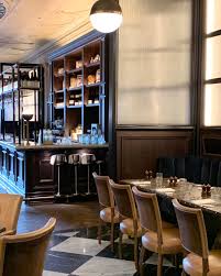 This chic and classic bar I discovered while in Scotland, served as  inspiration for a recently completed project. Travel always inspires my  spaces. #bardesign #restaurantdesign #classicinteriordesign  #blackandwhitetiles #marblefloor