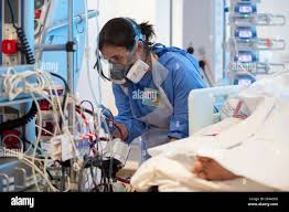 Extracorporeal membrane oxygenation (ECMO) specialist nurse Lisa Fontes  checks