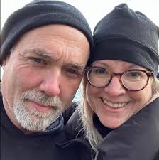 What motivates male grizzlies to kill cubs and how do female grizzlies  protect their cubs in Alaska?