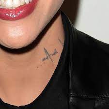 Ruby Rose Tattoos Steal Her Style Page 2 Ruby Rose Tattoo Rose Neck Tattoo Neck Tattoo