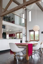 The post and beam construction style can be created by using square timber framing or round logs. Homes With Exposed Wooden Beams Are Simply Charming