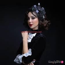 بعد ان ظهرت الفنانة المغربية وزوجة المطرب تامر حسني بفستان من تصميمها اثناء وضعه لبصمته على الطباعة الإسمنتية الشهيرة Crown Jewelry Fashion Crown