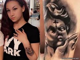 The illusion of ripped flesh uncovers what's truly inside; Danielle Bregoli S 16 Tattoos Meanings Steal Her Style