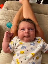 Beckha learns beach trash pickup at 17 weeks