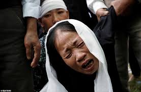 Mother of teenage Essex lorry victim, 19, weeps as she says a final goodbye  to her daughter