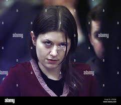 Natasha Cornett glares as an attorney for Dean Mullins questions a witness  about Mullins relationship with Cornett, during a sentencing hearing  Thursday, March 12, 1998 in Greeneville, Tenn. Cornett and Mullins are