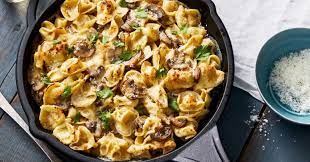 Baked Tortellini Alfredo With Mushrooms Recipe Tortellini Alfredo Tortellini Bake Baked Tortellini Alfredo
