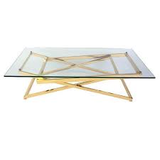 Available in coffee and side table sizes, this table will stand out alone or as a set. Gold Plated Stainless Steel Glass Coffee Table