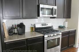 There's a feminine, modern edge to this kitchen and we're swooning for it. Changing Grout Color A Subway Tile Update The Happier Homemaker