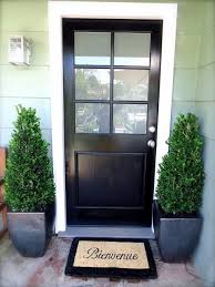 We were throwing around the idea of painting our interior doors black. 20 Impressive Ways To Frame Your Front Door With Planters Shelterness