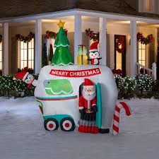 Holiday Living 8 99 Ft Animatronic Lighted Santa Christmas Inflatable Lowes Com Christmas Yard Decorations Cheap Halloween Decorations Christmas Inflatables