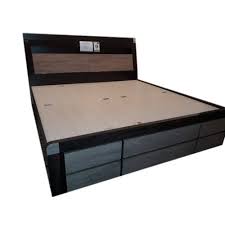 The bed frame can be as simple as 2 x 4s on top of the ground, or even patio retaining wall blocks. Wooden With Laminate Finish With Box Simple Wooden Double Bed Id 20495518512