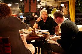 Big chunks of chocolate cookie dot this scoop. Guy Fieri S Nyc Restaurant In Times Square Guy S American Kitchen Bar Closes For Good Abc7 New York