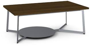 The table surface in walnut veneer and legs in solid walnut give a warm, natural feeling to your room.the distinctive grain pattern in the walnut veneer 1jcswe haven't had a coffee table for 13 years as the kids were little. Amisco Malloy Walnut Veneer Coffee Table 50366 90850 Fitz S Furniture Gallery