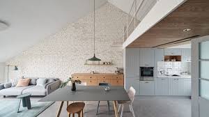 A 10 on 12 roof is useful when building this house plan in a spot that gets lots of snow. Hao Design Uses Pastel Hues For Pitched Roof Apartment In Beijing Dezeen