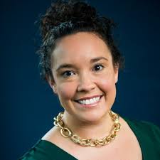 I've never had so much fun out in the field, the “corn field” that is. The  Milwaukee District's Womens Resource Group (WRG) partnered with The Hunger  Task Force to pick fresh corn