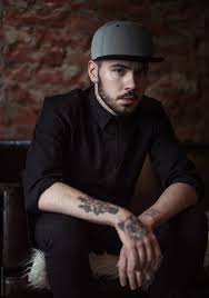 Headshot of a handsome man. Handsome Bearded And Tattooed Man By Milles Studio Loft Man