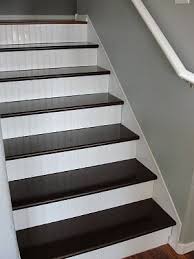 Basement Stair Idea Best One Yet High Gloss Stain On Treads In A Deep Color With White Wainscoting On The Rise Stair Remodel Home Renovation Stair Makeover