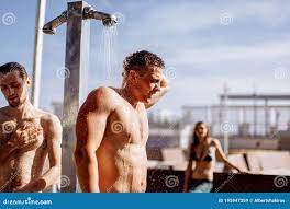 Handsome Young Topless Caucasian Man Taking an Outdoor Shower on Beach.  Stock Image - Image of muscles, muscular: 195947359