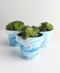 I highly recommend painting terracotta pots before buying new ones. Diy Marbled Terra Cotta Pots Alana Jones Mann