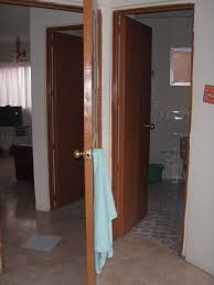 In real estate, ensuites (en suite or attached bath) are bathrooms that are connected to a bedroom. Bathroom With Cheater Ensuite Photo