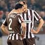 Injury Blow Hampers FC St. Pauli's Relegation Fight as Hansa Rostock Faces Promotion Setback