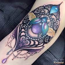 Jewel Beetle On The Knee Cap Done With Sabretattoosupplies Dcx Machine And Oztattskincare Aftercare Devilinthedet Jewel Tattoo Gem Tattoo Lace Tattoo