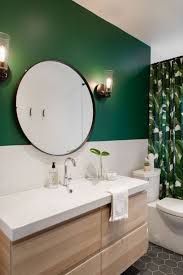 These mint green hexagonal tiles add a warmth to this otherwise all white scheme that has a scandi feel to it. 20 Green Bathroom Decor Magzhouse