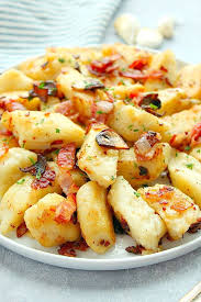 Polish Potato Dumplings Recipe Kopytka Made With Mashed Potatoes Flour And Egg These Dumplings Are Perfect S Potato Dumpling Recipe Recipes Dumpling Recipe