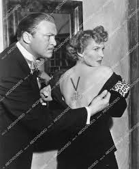 crp-03299 1942 Albert Dekker inspects Paulette Goddard's V for Victory  stamped