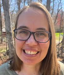 Meet Michelle Marle! Michelle will be teaching first grade this year. She  has 20 years of experience in education. Michelle likes the color green,  Minions, and chocolate. She enjoys gardening, playing games