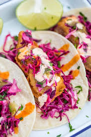 We use the freshest island fish grilled or dipped in a beer batter, fried to golden brown and filled with the works. Tilapia Beer Battered Fish Tacos