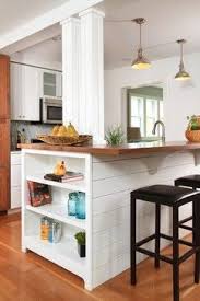 Instead of shuttling plates back and forth from dining room to kitchen, it's a simple matter to slide them right on who said that your kitchen island seating had to accommodate the entire brady bunch? 140 Kitchen Island W Built In Seating Ideas Kitchen Design Kitchen Remodel New Kitchen