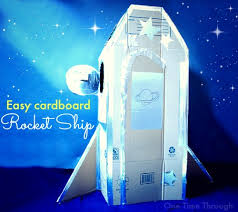 To make the wings, cut out large right angle triangles from a second box and tape them to the sides of the ship. How To Make An Awesome Diy Cardboard Rocket Ship One Time Through