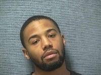 Police seize gun, marijuana "wax," arrest Canton man